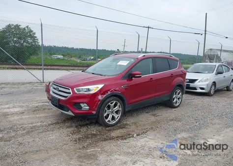 2019 Ford Escape Titanium z USA, uszkodzony, nr VIN 1FMCU9J97KUC29706